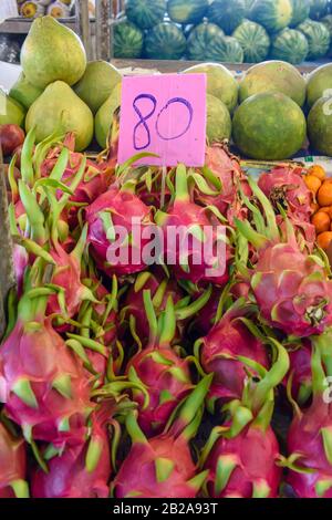 Dragonfruit on sale at a fruit stall in the traditional Mae Somchit Kata Fresh Market, Kata, Phuket, Thailand Stock Photo