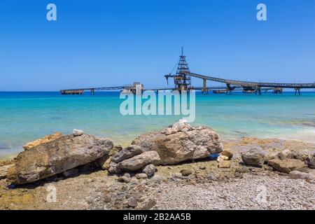 Salt Pier and rocks at sea of island Bonaire Stock Photo