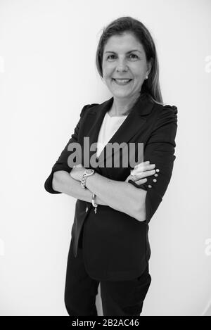 Mature businesswoman exploring the city of Bangkok, Thailand Stock Photo