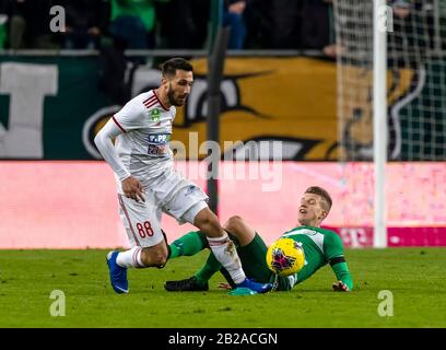 Lyes Houri of MOL Fehervar FC challenges David Siger of