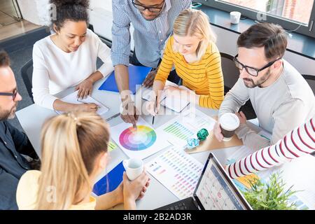 Business people meeting at office and use post notes to share idea. Brainstorming concept. Stock Photo