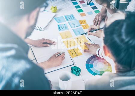Business people meeting at office and use post notes to share idea. Brainstorming concept. Stock Photo