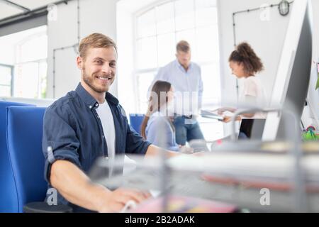 Developing programming and coding technologies. Website design. Programmer working in a software develop company office. Stock Photo