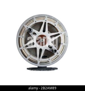 Old soviet inertial reel for spinning fishing. isolated on a white background. Stock Photo
