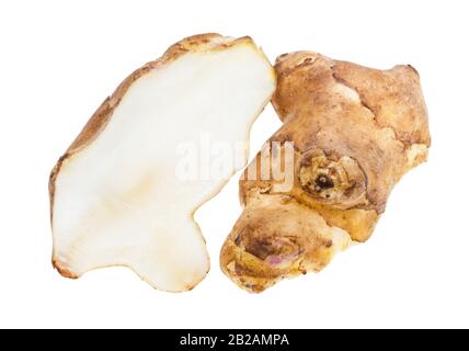 halved tuber of raw jerusalem artichoke (sunroot) isolated on white background Stock Photo
