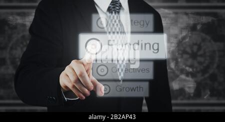 Businessman Pressing Button, Icons on Virtual Screen. Funding, Growth, Strategy Concept.