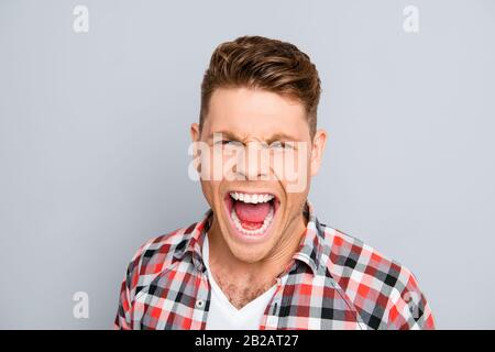 Portrait of furious angry man having big problems and screaming Stock Photo