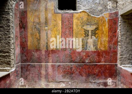 Oplontis Villa of Poppea - On the walls are represented, on a yellow and red background, gardens with beautiful fountains, Stock Photo