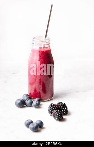 Download Blueberry Smoothie In A Glass Bottle Stock Photo Alamy PSD Mockup Templates