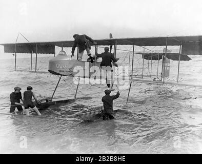 British aviation pioneer Claude Grahame-White testing a flying boat near Brighton. On the hull it says 'Wake up England'. Stock Photo