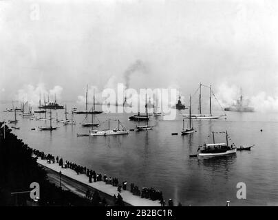 A salute of the English fleet was performed during the last Kiel Week (Kieler Woche) in peace. After the news that the Austrian Archduke Franz Ferdinand of Austria-Este was assassinated in Sarajevo, the fleet left the port of Kiel and returned to England. The photo was taken shortly before the outbreak of World War I. Stock Photo