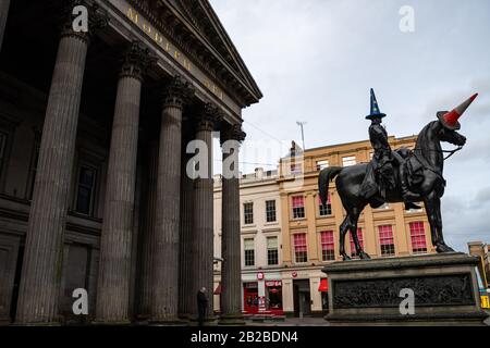 The Gallery of Modern Art in Glasgow with the Duke of Wellington statue where the traditional traffic cone has been replaced by a Pro-EU cone. Stock Photo