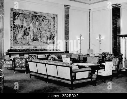 Sofas, chairs and armchairs in the reception room of the extension of the New Reich Chancellery in Berlin. Stock Photo