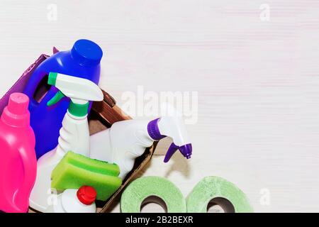 detergents bottles, on wooden background light, close-up Stock Photo