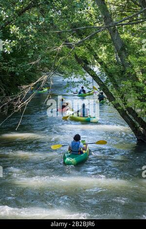 Montfort-sur-Risle (Normandy, northern France): teenagers kayaking on the Risle river Stock Photo