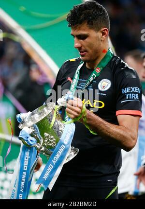 LONDON, UNITED KINGDOM. MARCH 01 Manchester City's Rodrigo with Carabao Cup Trophy after Carabao Cup Final between Aston Villa and Manchester City at Stock Photo