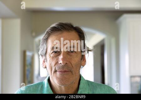 Senior man spending time at home Stock Photo