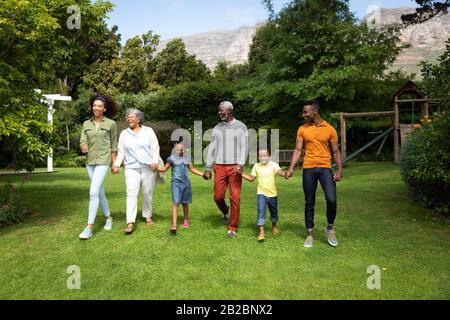 Family spending time together in the garden Stock Photo