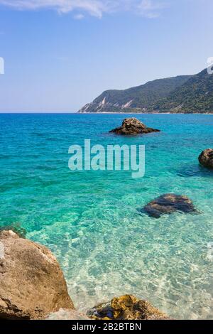 Vertical photo of Pefkoulia beach, view from Agios Nikitas village, west coast of Lefkada island, Greece. Stock Photo