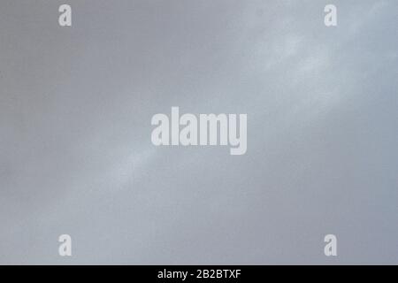 Matte metal surface with rays of light, silver color, texture and background, copy space Stock Photo