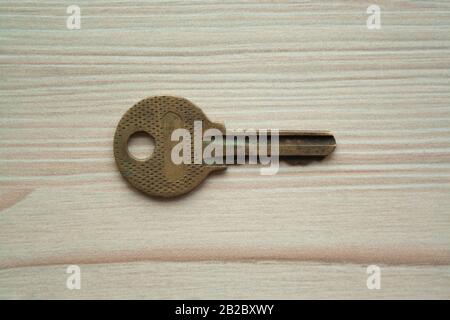 Close up macro shot of old rusty grunge key top view. Single key. Access, security, enter Stock Photo