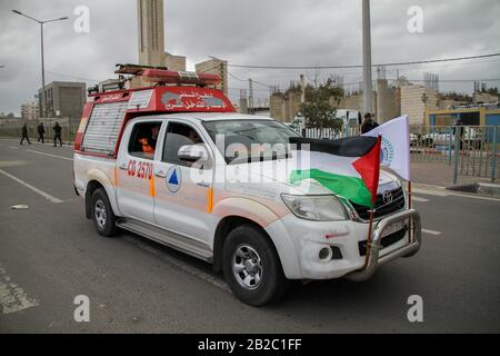 February 29, 2020: Gaza City, Palestine. 01 March 2020. The General Directorate of Palestinian Civil Defense in Gaza organise a parade of their vehicles in Gaza City to mark World Civil Defence Day. World Civil Defence Day commemorates the entry into force of the International Civil Defence Organisation (ICDO) constitution as an intergovernmental organisation in 1972, with the aim to raise public awareness about the significance of the Civil Protection and the importance of preparedness, prevention, and self-protection measures in the event of accidents or disasters (Credit Image: © Ahmad Has Stock Photo