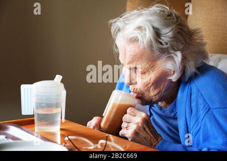 Portrait of an old lady suffering from dementia - John Gollop Stock Photo