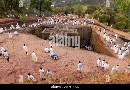 Morning mass, religious service, at Saint George stone church, one of eleven rock-hewn monolithic churches in Lalibela, a city in the Amhara Region of Stock Photo