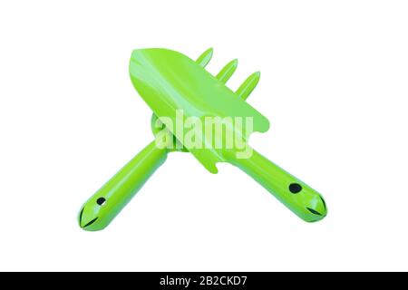 Clipping path group set. Gardening tools are small spade green shovel and cultivator fork For shoveling and planting trees isolated on white backgroun Stock Photo