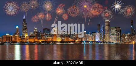 Multicolor Firework Celebration over the Panorama of Chicago Cityscape river side along Lake Michigan at beautiful twilight time, Illinois, United Sta Stock Photo