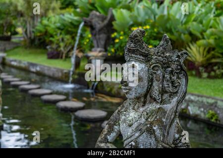 Statue at the Tirta Gangga palace in Bali Indonesia Stock Photo