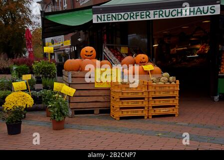 Large display of halloween carved pumpkin lanterns on display at Neindorfer market, Hamburg, Germany. October 2019 Stock Photo