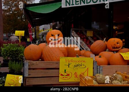 Large display of halloween carved pumpkin lanterns on display at Neindorfer market, Hamburg, Germany. October 2019 Stock Photo