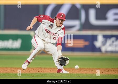 Houston, Texas, USA. 1st Mar, 2020. Arkansas Razorbacks second baseman  Jacob Nesbit (5) fields a ground ball in the 2020 Shriners Hospitals for  Children College Classic baseball game between the Baylor Bears and the  Arkansas Razorbacks at Minute