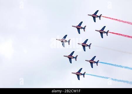 The French Air Patrol (French: Patrouille de France) performing a demonstration to celebrate the Bastille Day. Stock Photo