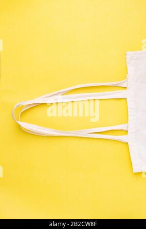 Eco white textile bag, zero waste. Top view, vertical composition Stock Photo