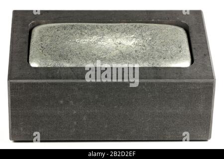 graphite mold with zinc bar isolated on white background Stock Photo