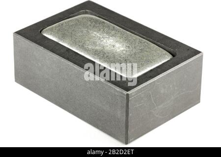 graphite mold with zinc bar isolated on white background Stock Photo