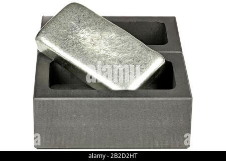 zinc bar on graphite mold isolated on white background Stock Photo