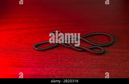 Displayed in the adjacent table is the web color dark red. Stock Photo