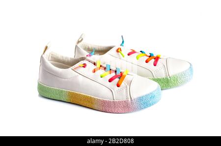 Sneakers shoes style fashion multi-colored pair for the child on a white background. Stock Photo