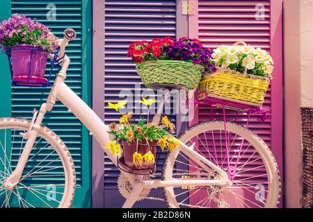 Abstract colorful decoration with painted vintage bicycle and