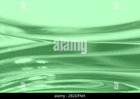 Abstract blurred soft focused futuristic wavy background. Trendy mint colored minimal backdrop. Glass texture Stock Photo