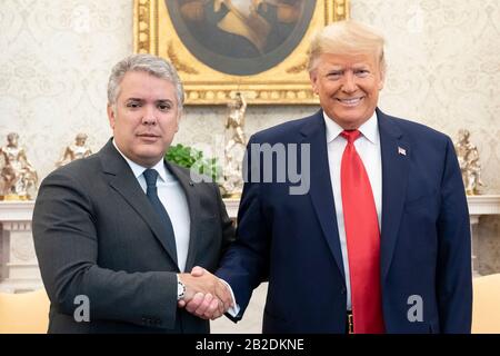 Washington, United States Of America. 02nd Mar, 2020. Washington, United States of America. 02 March, 2020. U.S President Donald Trump shakes hands with Colombian President Ivan Duque Marquez in the Oval Office of the White House March 2, 2020 in Washington, DC. Credit: Joyce N. Boghosian/White House Photo/Alamy Live News Stock Photo