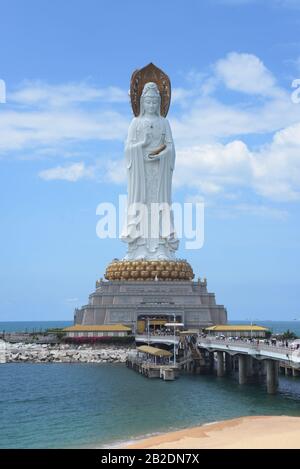 buddha culture statue of goddess Guanyin Nanshan on Hainan island in China on ocean Stock Photo