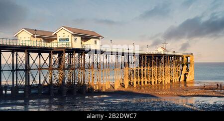 Just before dawn at Penarth Pier near Cardiff on the south coast of Wales, United Kingdom Stock Photo