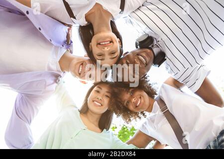 Youth And Friendship. Happy International Teenagers Standing In Circle, Taking Selfie Stock Photo