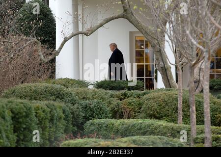 Washington, United States Of America. 02nd Mar, 2020. United States President Donald J. Trump walks out of the Oval Office at the White House in Washington, DC, U.S., as he departs for a Keep America Great Rally in Charlotte, North Carolina on Monday, March 2, 2020. Credit: Stefani Reynolds/CNP | usage worldwide Credit: dpa/Alamy Live News Stock Photo