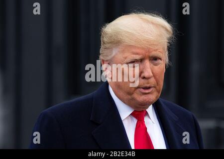 Washington, United States Of America. 02nd Mar, 2020. United States President Donald J. Trump speaks to members of the media on the South Lawn of the White House in Washington, DC, U.S., as he departs for a Keep America Great Rally in Charlotte, North Carolina on Monday, March 2, 2020. Credit: Stefani Reynolds/CNP | usage worldwide Credit: dpa/Alamy Live News Stock Photo