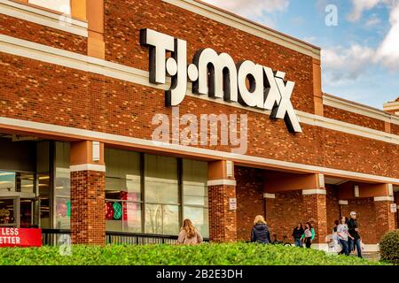 Charlotte, NC/USA - December 14, 2019: Medium horizontal closeup of 'T.J. Maxx' store facade showing brand in bold white letters on a brick building. Stock Photo